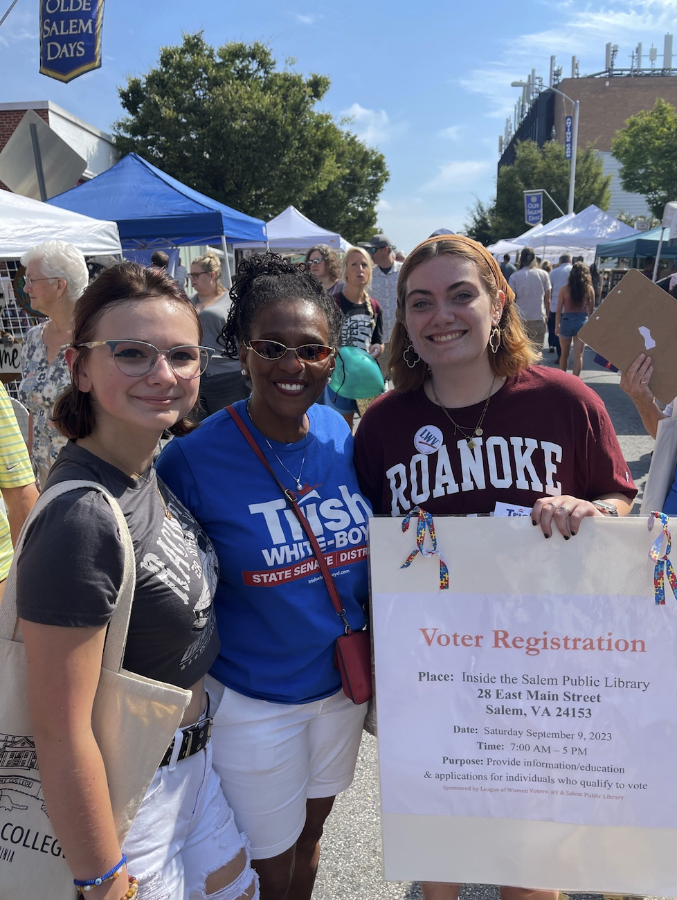 Trish with volunteers at a community event